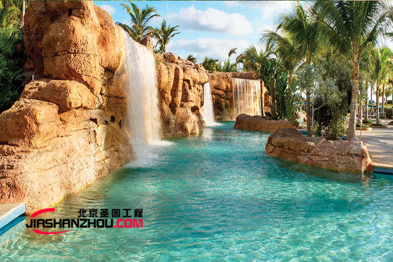 植物的加入使水池塑石假山景觀設計與周圍環境緊密相連