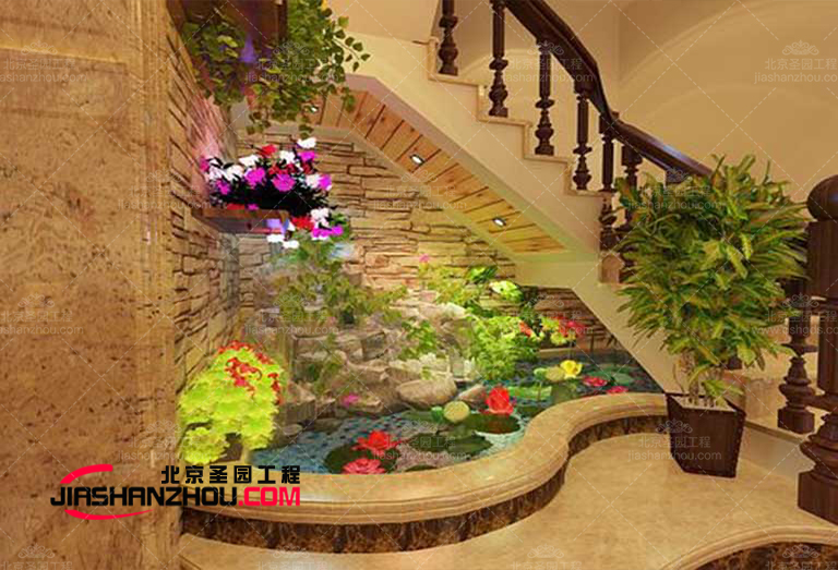 東北一家人餐廳室內水泥塑石假山景觀小品制作工程施工中