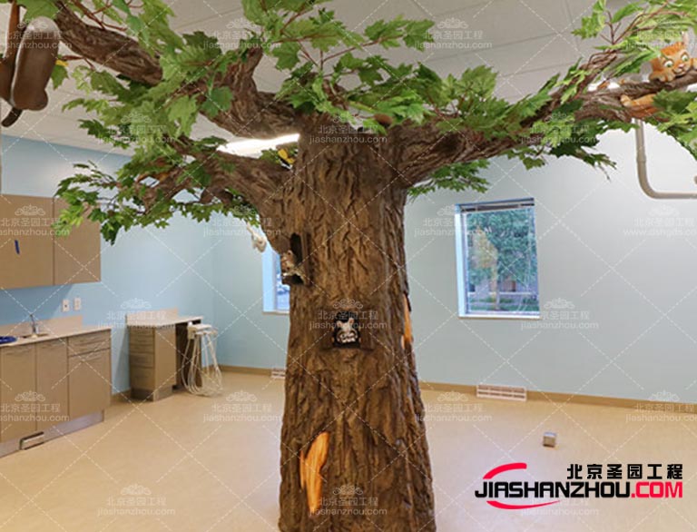 如今的仿真樹選擇一些擁有柔和綠色葉子或淡粉色花朵的植物