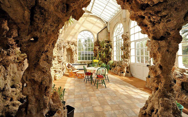 北京廠家的現代仿古巖洞主題客棧設計制作指南